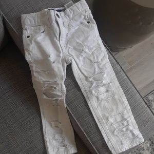 Distressed denim jeans